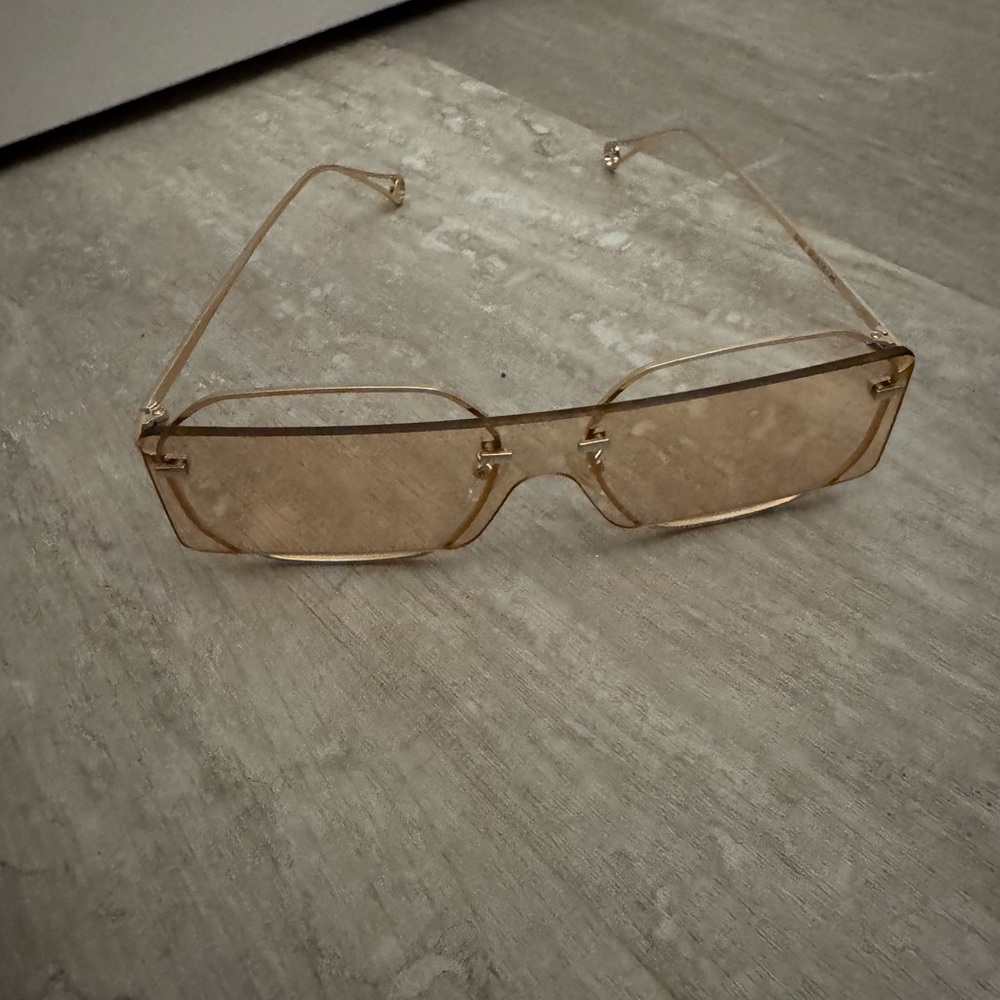 Elegant Gold-Tinted Sunglasses